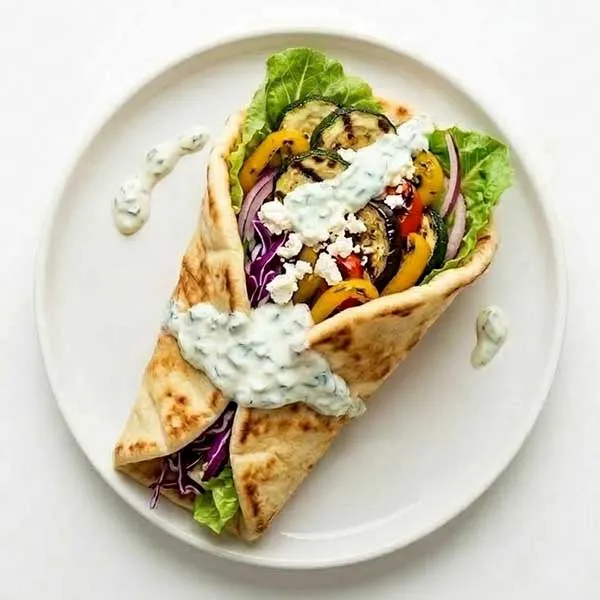 Greek veggie gyro wrap with tzatziki & feta